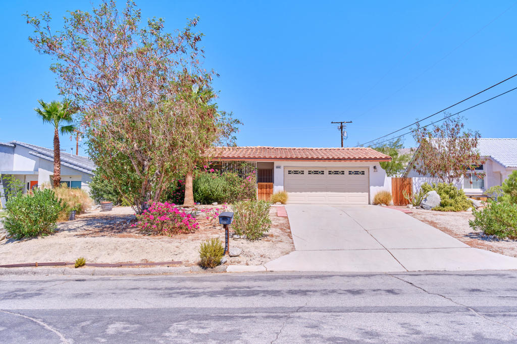 WOW!! 3 BEDROOMS 2 FULL BATHROOMS3rd BEDROOM used as dining room could be DEN or OFFICE. ALL tiled floors, no CARPET. Large KITCHEN. COVERED PATIODouble Car GARAGE plus long drivewayenough for 4 cars....PLUS view
