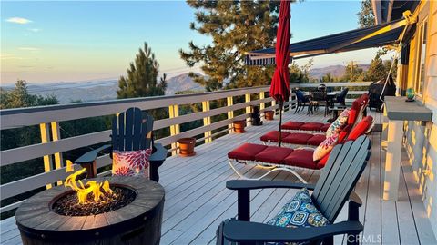 Photo of 28935 Banff Dr, Lake Arrowhead, CA 92352 (MLS # HD25250607)