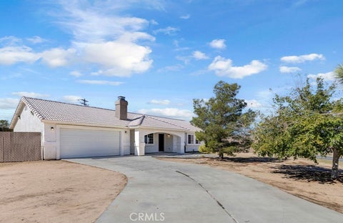 Photo of 7310 Del Monte Avenue, Yucca Valley, CA 92284 (MLS # SW26222981)