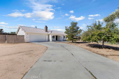 Photo of 7310 Del Monte Avenue, Yucca Valley, CA 92284 (MLS # SW26222981)