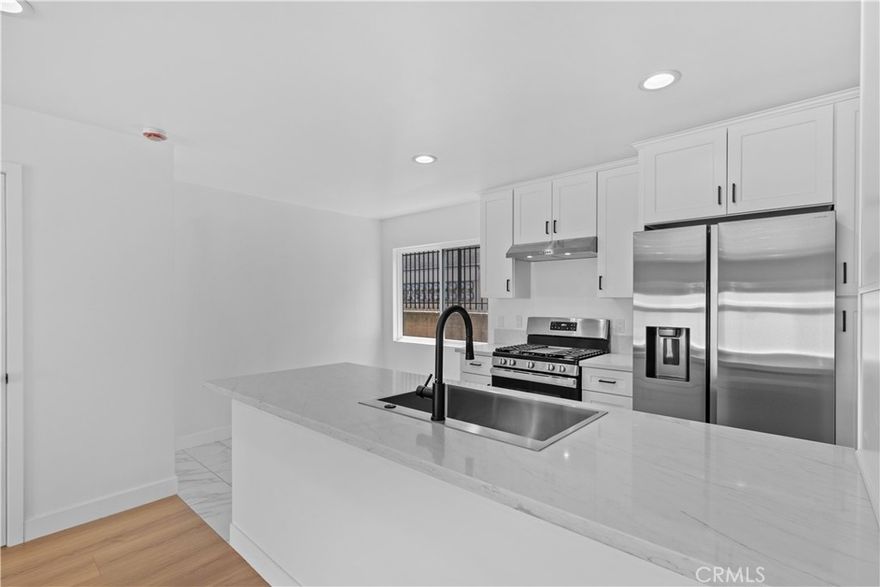 Just Remodeled! Two-story townhome style condo with 2 parking, located in a quiet gated small complex with only 17 units. 2 bedrooms 1 and 1/2 bathroom, legal laundry in the unit   with stainless steel appliances, new kitchen cabinets with quarts countertops, recessed lightings,  central AC & Heather, private patio.  Fantastic location near freeways, shopping, and dining, this ready to move in  home offers it all. Don’t miss your opportunity to make it yours! Low HOA fee only $300.