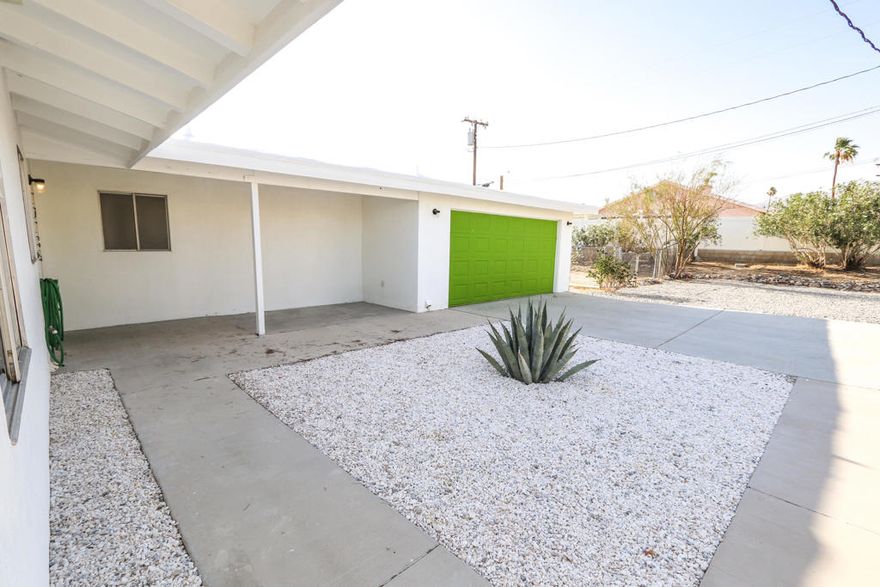 Welcome to your dream oasis! This beautifully remodeled Mid-Century Modern home boasts stunning west-facing views and sits on an oversized corner lot exceeding 9,000 sqft, offering endless possibilities for an ADU or pool. Step inside to discover a light-filled interior featuring new flooring, cabinets, central AC and Heat, fresh paint, and stylish window coverings--truly move-in ready! This spacious home includes two full-size bedrooms along with a versatile extra bonus room with private entrance. Enjoy the convenience of a two-car garage and ample RV access. Relax in the inviting living room with natural stone finishes, while taking in breathtaking views of the San Jacinto Mountains.Located in a prime area with no HOA fees, you'll be just minutes away from the rejuvenating Natural Hot Springs Spas, vibrant dining options, and the heart of downtown Palm Springs. Don't miss out on this gem--schedule your showing today and experience the perfect blend of modern comfort and serene lifestyle!  FHA and USDA eligible.