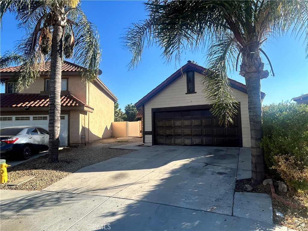 Welcome to this spacious single-story home located on a quiet cul-de-sac in a convenient Moreno Valley neighborhood. Featuring 4 bedrooms and 2 bathrooms, this home features vinyl flooring throughout, vaulted ceilings, and a cozy living room with a fireplace perfect for relaxing or entertaining. The kitchen features ample cabinet space, tile countertops, and a functional layout with easy access to the dining and family areas.