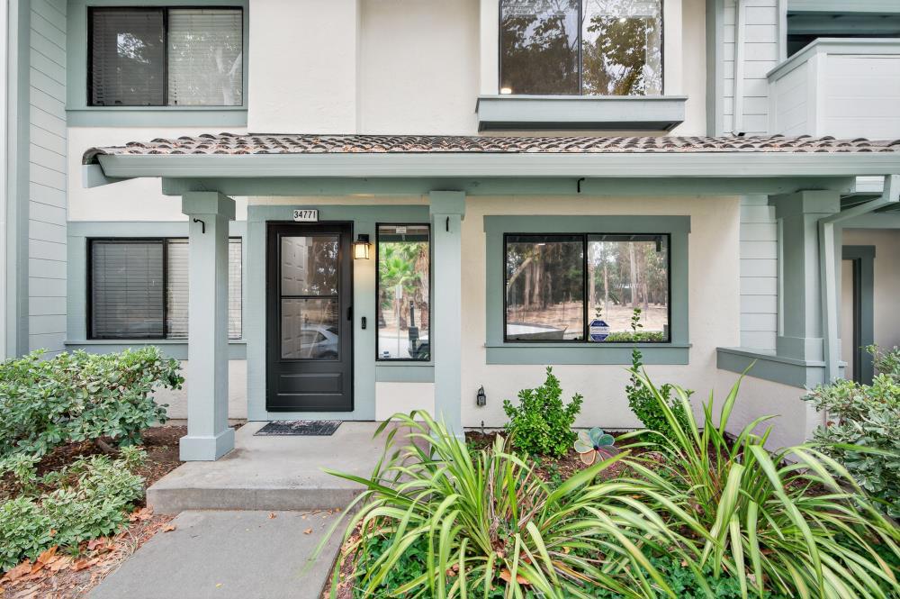 A home that has never been rented before.Welcome to this beautifully maintained 2-bedroom 1.5-bath home in Fremonts highly desirable Ardenwood neighborhood. Perfectly situated facing Ardenwood Historic Farm, the home offers serene views of lush greenery, toy trains passing through, and the natural beauty of the outdoors right from your windows. Freshly painted, laminate floors, enhanced with new recessed lighting in every room, the space feels bright, modern, and inviting. The recently updated kitchen and bathrooms feature stylish finishes and new appliances, making this home truly move-in ready. Brand new Washer & Dryer. Laundry is conveniently located in the attached garage, which provides one parking space, and extra storage shelving. An extra Car Port too. Natural sunlight fills every corner, creating a warm ambiance. Just minutes from top-rated Forest Park elementary school, shopping, and easy commute routes, this Ardenwood gem is a rare find. Enjoy easy access to local amenities diverse dining options, and coffee shops all within walking distance. The location provides a quick commute to major employers via I-84, I-880, Facebook/Google shuttles, BART. Experience Peninsula-adjacent living at a more attractive price point, walking distance to Forest Park elementary!