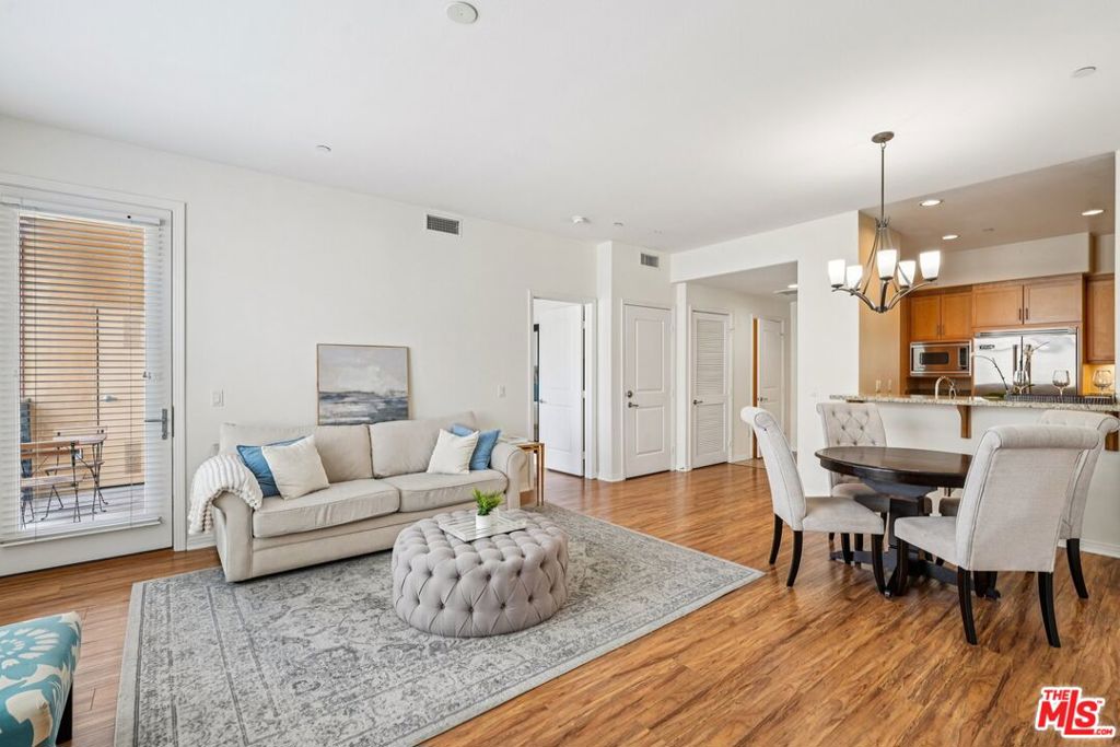 Welcome to elevated coastal living at the highly sought-after Indigo complex in the heart of Marina del Rey! This light-filled 1-bedroom, 1.5-bath residence offers a spacious open layout with sleek finishes, abundant natural light, and a peaceful ambiance. The bedroom features double closets, an en-suite bath, and direct access to a private patio, perfect for morning coffee or evening unwinding. Enjoy the convenience of in-unit laundry, a modern kitchen, and an expansive open living and dining area bathed in sunlight. This residence also provides ample storage space throughout, ensuring comfort and functionality. Includes gated side-by-side parking plus guest parking located in a separate gated garage area. The community offers exceptional amenities including a gym, relaxing jacuzzi and steam room, inviting BBQ area, fire pit with seating, beautifully landscaped courtyards, and secure gated access. Just steps from Marina Marketplace, top restaurants, coffee shops, Equinox, and Costco, this home offers easy access to the beach, bike paths, and major freeways minutes away. Experience the best of coastal living in a home you won't want to miss!