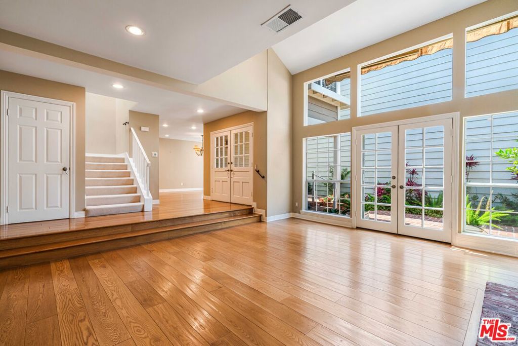 Beautiful patio home located in the desirable Villa Marina East IV community. Step through the charming front patio, featuring classic brick flooring and immaculate landscaping, into a space filled with light and elegance. High vaulted ceilings create a spacious atmosphere, while the living room with fireplace and formal dining area are enhanced by large windows that flood the home with natural light. The updated kitchen offers stainless steel appliances and opens directly to the patio, perfect for indoor-outdoor living. The massive primary suite features a walk-in closet and a luxurious en-suite bathroom with a separate shower, soaking tub, and dual vanity. Upstairs, the hallway includes two convenient pull-out beds for guests. The second bedroom, located down the hall, offers generous space with ample closet storage and the convenience of its own en-suite bath. Additional features include a 2-car garage and access to exceptional community amenities, including pools, spa, tennis courts, and 24-hour gated security. Close proximity to shops, restaurants, Playa Vista, freeway access, and so much more!