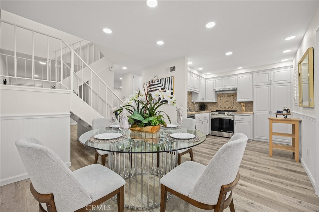 Located in a desirable and well-maintained complex within the highly rated Temple City School District, this beautifully remodeled townhouse offers modern comfort, quality upgrades, and exceptional value—not only in Temple City, but also compared to neighboring cities. Set just off Temple City Boulevard, the home enjoys both convenience and privacy. This move-in ready home has been thoughtfully renovated with meticulous attention to detail. It features two spacious bedrooms, a fully updated kitchen with brand-new appliances, as well as elegant recessed LED lighting throughout. An inviting, spacious living room and a separate dining area flow seamlessly into the open kitchen, creating a comfortable and functional layout for everyday living and entertaining. Fresh interior paint, new laminate flooring, new central A/C and Heating unit, new water heater unit, and new ceiling fiberglass insulation batts, and stylish wood shutter window coverings add warmth and sophistication to every room. A convenient inside laundry area adds to the ease of daily life. The popular North-South orientation allows for excellent natural light and a comfortable breeze throughout the day. A private yard accessible from the kitchen and dining area provides extra outdoor space, in addition to the community's central grassy play area. Additional highlights include a detached two-car garage, newly painted interior, with extra storage and one of the lowest HOA fees in the area. Whether you're a first-time buyer, downsizer, small family or invenstor, this property offers the perfect blend of value, comfort, and location. Don’t miss this rare opportunity to own a turnkey home in one of Temple City’s most sought-after communities.
