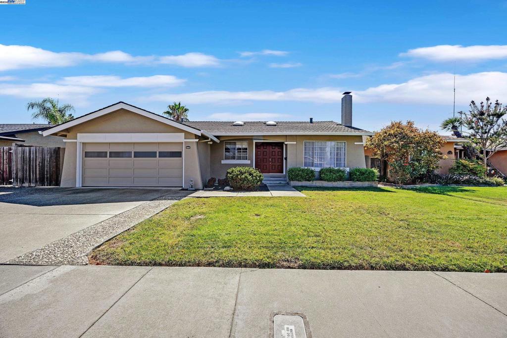 Charming Val Vista home with amazing addition of huge family room with brick fireplace, and dining area. Very well maintained with original hardwood floors through hallways, living room and all bedrooms, three skylights adding great light, brand new exterior paint. Kitchen is nicely appointed with large breakfast bar seating four, includes the refrigerator. Owner suite with two closets, bath with large shower, sliding door to deck and backyard. Additional three bedrooms are very spacious. Backyard is low maintenance with artificial turf, garden area and large storage building done with permits and matches the home exterior, perfect for office or she shed or he shed. Walk to elementary school, Val Vista Park and nearby shopping center, easy freeway access to 580 and 680. Quiet Court away from freeway noise. Great value with 2,169 sq. ft. in Pleasanton.