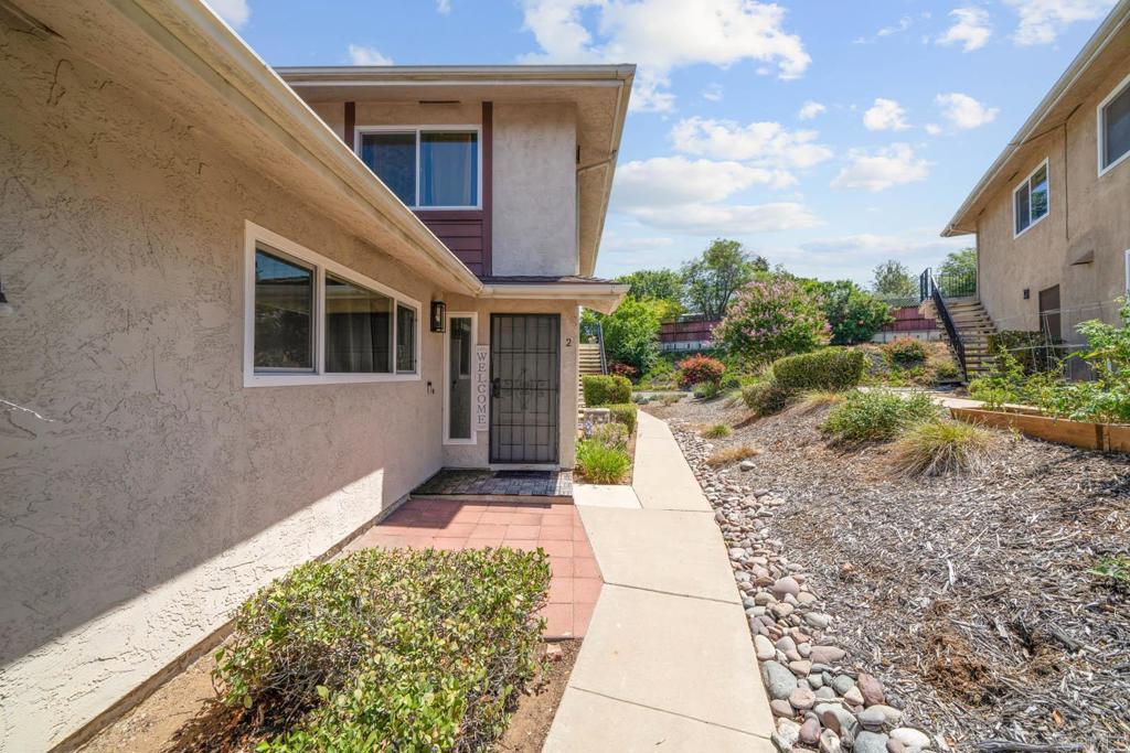 **This house Qualifies for both 1% down payment with no MI or a 4.5% Rate, Ask me how** Discover this charming two-story single-family home in Lakeside, offering 2 bedrooms, 1 full bathroom, and approximately 903 sq. ft. of bright living space. Enjoy a practical kitchen equipped with a dishwasher, disposal, microwave, electric oven, and electric stove, plus central heating and air conditioning for year-round comfort. This home includes an assigned tandem garage space and one additional parking spot, making parking simple and convenient. Just steps away, relax in the community’s fenced pool or take advantage of easy freeway access for smooth commutes throughout the Lakeside and San Diego area. Furniture can stay with the home, adding extra value and convenience for new owners. The HOA fee covers water, sewer, trash, security, exterior maintenance, and landscaping.