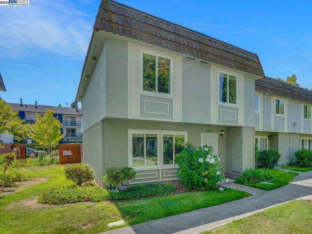 On a peaceful corner in Pleasanton, where tree-lined sidewalks lead to parks, top-rated schools, and the winding Iron Horse Trail, sits a home ready to welcome its next chapter. Down the street from the charm of downtown, life feels unhurried. Perfectly balanced between convenience and quiet. Step inside, and the light greets you dancing across new flooring in the spacious living areas and spilling into a freshly remodeled kitchen, where a tray ceiling adds a graceful touch. This is a space meant for gathering, whether around the dining table for Sunday dinners or out on the private back patio for warm summer nights. Upstairs, 4 bedrooms are tucked together, each wrapped in soft new carpet for comfort and warmth. Updated bathrooms bring a fresh, modern feel, while thoughtful details throughout reflect the care this home has received. Enjoy morning walks along the nearby trails, afternoons at the farmers market, or quiet evenings in this serene neighborhood. Built in 1978, with 1,474 sqft of living space, 4 beds, and 2.5 baths, this home offers an incredible value for Pleasanton. An inviting introduction to the area and a place where everyday moments feel just a little more special.