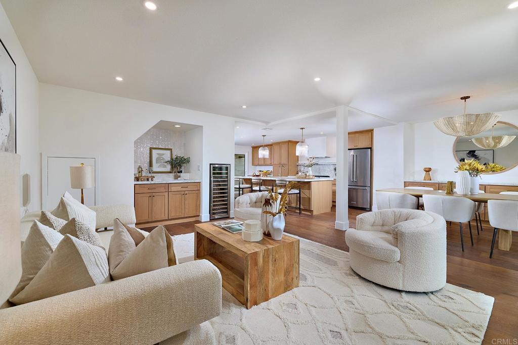 Welcome to this Stunning fully renovated home nestled in a prime location along the 9 South fairway of the La Valle Club Golf Course with sweeping views across the course to the scenic hills beyond. Thoughtfully redesigned by Rice Design & Build, this home features a show-stopping open kitchen with solid oak cabinetry, a 10' island topped with striking Dekton Bergen countertops , KitchenAid appliances including a 5 Burner gas Range & an 80 bottle wine cooler- perfect for entertaining. The interior boasts custom- stained European White Oak engineered wood floors throughout, all new windows and doors, brand new A/C, designer lighting, curated tilework and an abundance of natural light that fills every room. Offering 3 bedrooms and 3 full bathrooms, the home includes a convenient entry-level bedroom and bath plus 2 luxurious primary suites upstairs. one with a view of the golf course, the other a private sun deck both with walk-in closets and spa inspired bathrooms. Just steps from the lush, park-like Villas pool area and the vibrant La Valle Coastal Club Resort, which offers a 27-hole Championship golf course and a variety of membership options and amenities. This is Southern California living at its finest—don’t miss the opportunity to make this exquisite home yours!