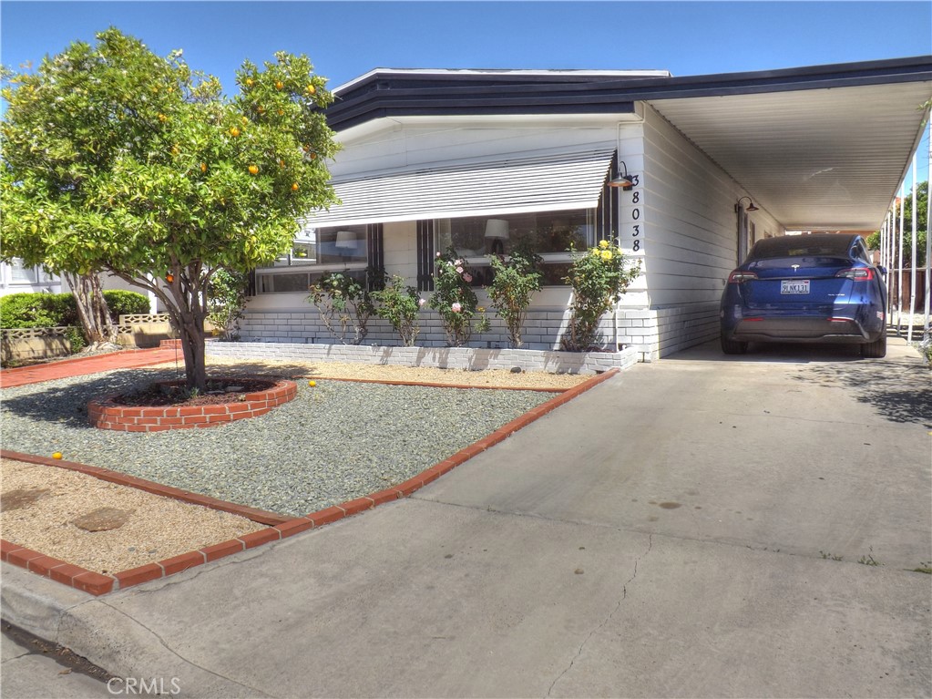 Own the land!!! Brand new Central A/C and furnace. Paid off solar!!! Golf Knolls!!! Right around the corner from the Golf Knolls recreation area. Dual master suites!!! Beautifully updated mobile home in the Golf Knolls section of The Knolls, a 55+ community. This bright and airy home has an abundance of natural light. Home has been remodeled with luxury waterproof vinyl plank flooring (with no transitions), new casings and baseboards, new paint inside and out, new fixtures, recessed lighting throughout!!! New cabinet doors and drawer fronts in the kitchen with quartz countertops, with island seating. All new kitchen appliances. Conveniently, there is a separate laundry room. Multiple storage closets throughout the home!!! The primary bathroom has a large vanity with dual sinks and quartz countertop. Secondary master suite bathroom has a beautiful new vanity. Low maintenance yard with beautiful rose bushes and citrus trees. Murrieta has many great restaurants, an abundance of shopping, and is close to medical services. This home is very close to Temecula and all it has to offer with wineries just up the road.