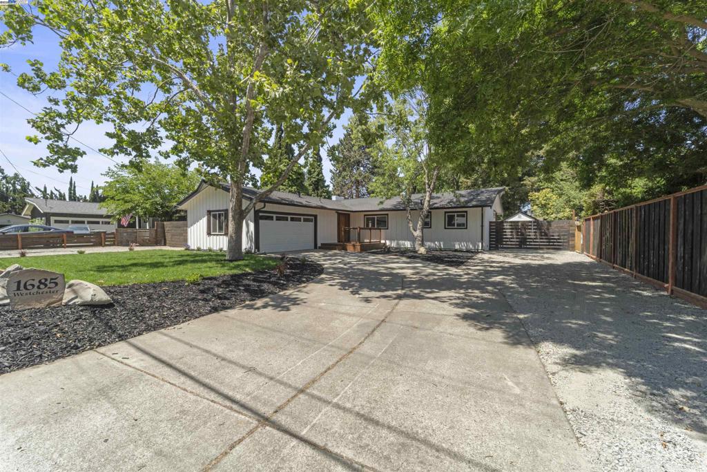 Welcome to 1685 Westchester Pl — a stunning 4-bedroom, 2-bathroom home tucked away on a quiet, beautifully maintained cul-de-sac in the heart of Concord. Boasting 1,395 square feet of thoughtfully designed living space, this home has been fully remodeled from top to bottom with exceptional attention to detail and modern finishes throughout. Step inside to discover an open-concept floor plan that seamlessly blends the living, dining, and kitchen areas perfect for entertaining or everyday living. The gorgeous kitchen is a true showstopper, featuring sleek cabinetry, premium countertops, and high-end appliances that make cooking a joy. Retreat to the luxuries master suite, complete with custom closets and a spa-inspired bathroom featuring a soaking tub your private escape at the end of the day. Every inch of this home has been beautifully updated, from the floors to the fixtures, offering turnkey perfection. The landscaped front and back yards offer lush, serene outdoor spaces ideal for relaxing or hosting guests. Plus, a versatile detached office/studio in the backyard adds even more flexibility perfect for working from home, creating, or hosting overnight guests. Don't miss the opportunity to own this exceptional home!