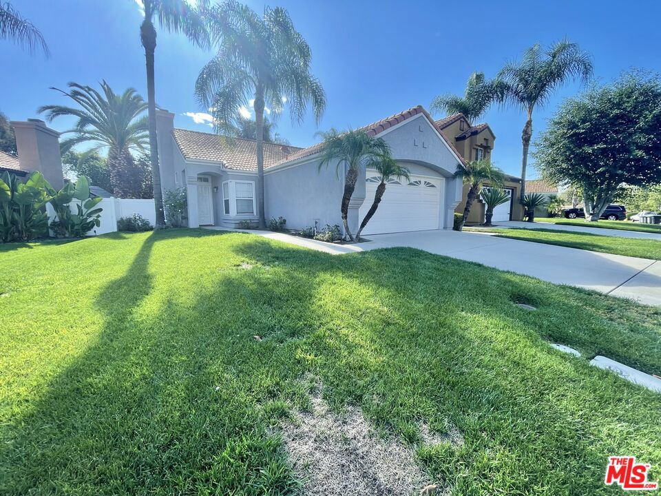 Welcome to this stunning fully remodeled single-story home located in the highly desirable Paloma del Sol community of Temecula. Recently upgraded from top to bottom, this property offers modern style, comfort, and convenience in one of Temecula's most sought-after neighborhoods. This thoughtfully designed home features 3 spacious bedrooms, 2 full bathrooms, and an open floor plan that maximizes both natural light and functionality. The living room boasts vaulted ceilings, a cozy fireplace, and brand-new finishes, creating a warm yet contemporary space for gatherings. The kitchen is a true showpiece with new white shaker cabinetry, quartz tile countertops, stainless steel appliances, designer backsplash, and updated lighting. Both bathrooms have been completely renovated with custom tile work, new vanities, fixtures, and modern finishes that bring a spa-like feel. Throughout the home, you'll find new luxury plank flooring, fresh interior paint, energy-efficient dual-pane windows, recessed lighting, ceiling fans, and upgraded hardware. Every surface has been refreshed to provide a clean, move-in ready environment. The primary suite offers an en-suite bathroom. Two additional bedrooms provide flexibility for family, guests, or a home office. Step outside to the backyard, where you'll find a covered patio, fresh landscaping, and ample space for entertaining. Mature trees and fencing add privacy and shade, making this yard perfect for BBQs, gatherings, or relaxing evenings. This master-planned community is known for its abundant amenities, including five swimming pools, tennis courts, basketball courts, greenbelts, parks, playgrounds, and miles of walking trails. The neighborhood is beautifully maintained with tree-lined streets and a strong sense of community. Additional highlights include a two-car garage, spacious driveway, and prime location. Paloma del Sol is conveniently close to award-winning Temecula schools, shopping centers, dining options, golf courses, and the world-famous Temecula Wine Country. Easy access to both the I-15 and I-215 freeways makes commuting simple. This fully remodeled single-story gem in Paloma del Sol offers the rare opportunity to enjoy modern upgrades, resort-style community living, and an unbeatable location. Homes like this don't come around often schedule your private tour today!