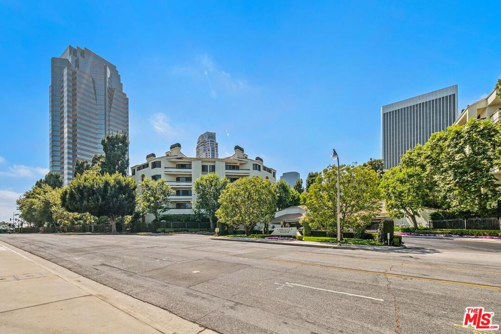 Elegant Single-Story Residence in Prestigious Century Park Place. Welcome to this spacious and beautifully furnished single-level Condo featuring three bedrooms and two and a half bathrooms, ideally located in the heart of Century City within the highly sought-after Century Park Place, a full-service, resort-style gated community. Nestled amidst lush, manicured landscaping, this residence offers a serene retreat from the city's hustle. The inviting layout includes a tiled entryway, a generous dining area, and a living room with a cozy fireplace that opens to a private balcony perfect for relaxing or entertaining. The large eat-in kitchen is equipped with stainless steel appliances, recessed lighting, and a convenient pass-through bar to the dining area. The primary suite boasts a fireplace, plantation shutters, abundant closet space, and a luxurious en-suite bathroom with a dual vanity, soaking tub, and separate shower. Two additional well-sized bedrooms share a full bathroom, while a separate powder room and a hall closet with side-by-side washer and dryer add convenience. The unit includes Central Air/Heat, and two side-by-side parking spaces. Park Place offers an array of resort-style amenities, including: 3 heated pools and spas, 4 sport courts (Tennis, Pickleball, and Basketball), a Clubhouse, BBQ/picnic areas, Fitness rooms with saunas and restrooms in each building, On-site management office, ample guest parking, 24/7 guard-gated security and controlled access. Enjoy unparalleled convenience with easy access to Westfield Century City Shopping Center, Gelson's Market, Rancho Park Golf Course, Fox Studios, Beverly Hills, UCLA/Westwood, and major freeways. Park Place is truly an urban oasis, offering tranquility, luxury, and accessibility in one of Century City's most desirable communities.