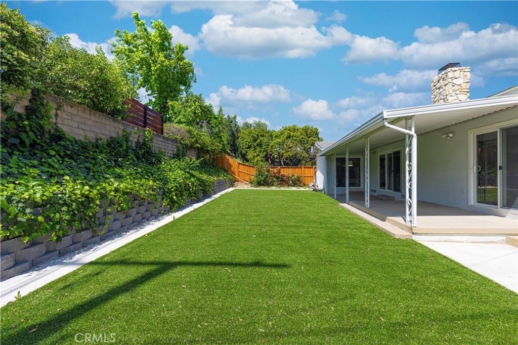 Photo of 23800 Tiara Street, Woodland Hills, CA 91367 (MLS # AR25102312)