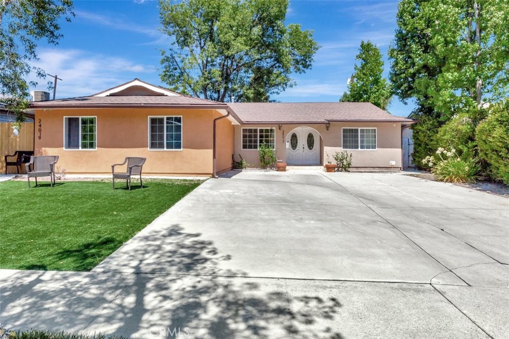 Gorgeous Remodeled Woodland Hills Single Story with ADU!
Welcome to this beautifully remodeled single story home in one of Woodland Hills most desirable neighborhoods. Featuring 5 bedrooms and 4 Full bathrooms plus an additional 1 bedroom, 1 full bath with a private entrance, this residence offers incredible versatility, perfect for an ADU rental, guest suite, or in-law quarters.
Step inside to a bright, open floor plan with high ceilings, recessed lighting, beautiful Travertine flooring, and elegant French windows that fill the home with natural light. Multiple living spaces, including a spacious living room, family room, and formal dining area, create the ideal setting for both everyday living and entertaining.
The upgraded kitchen showcases sleek stainless-steel appliances, while the remodeled bathrooms bring a modern, spa like feel. The primary suite offers a private retreat with its own ensuite bathroom, and the main bathroom features a relaxing jacuzzi tub, a perfect escape after a long day.
Enjoy Southern California living in the spacious backyard filled with fruit trees, ideal for gatherings or quiet relaxation. Practical upgrades add to the appeal, including solar panels, 2 tankless water heater, newer sewer line, a long private driveway, and ample street parking.
Located just minutes from The Village, Westfield Topanga, The Promenade, shops, dining, and top-rated schools, this home combines convenience, comfort, and style in one perfect package.
A rare opportunity in Woodland Hills—don’t miss the chance to make this stunning property your forever home!