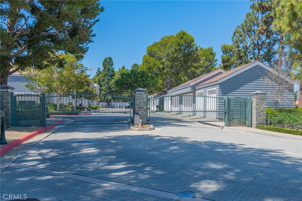 Welcome to this upper unit, light and bright condo in gated Bayridge located in Newport Beach. The welcoming front patio is very private and a wonderful way to start or end your day. Once inside, natural light fills the open concept living, kitchen and dining areas enhanced by stylish wood vinyl flooring. The modern kitchen features a newer refrigerator, newer electric range, microwave, dishwasher and trash compactor. The living room offers sliders out to the private patio. The Primary bedroom and ensuite are spacious and nicely appointed. An additional nice sized bedroom could also double as a home office and has easy access to the 2nd bathroom. A newly purchased stackable washer and dryer are convenienty located in a separate laundry area. This unit offers an oversized 2 car garage with substantial storage area for those bins and luggage! Bayridge offers 4 hot tubs and a community pool. The location is ideal with easy access to Fashion Island, the beach, John Wayne Airport and the 73 and 405 Freeways. Welcome home!