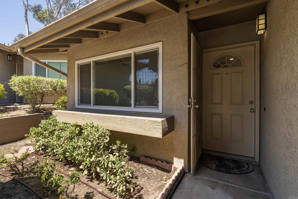 Very nice 2br/1ba Condo located close to SDSU, great freeway access. Unit was updated about 8 years ago: work performed was new cabinets, new countertops, new vanity, new shower tile, new appliances. The unit carpet was just installed 3 weeks ago. Washer and Dryer located in garage, both convey. New dual glazed windows installed 3 years ago. Unit has a single car garage space as well as a reserved spot in front that is uncovered. Property overlooks 70th Street, nice patio space as well.