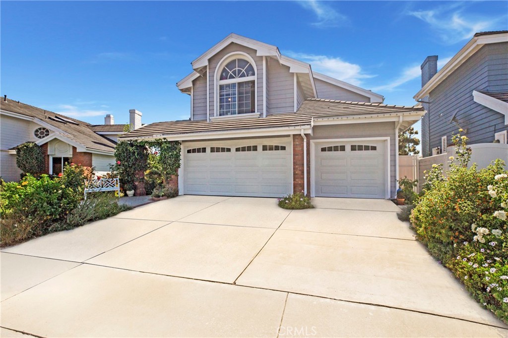 Welcome to 54 Richmond Hill, a stunning lease opportunity in the coveted Beacon Hill community of Laguna Niguel. Tucked away at the end of a quiet cul-de-sac, this four-bedroom, three-bath home spans 2,662 square feet and captures sweeping views of the hills and Pacific Ocean, with breath taking sunsets to enjoy year-round. The main level features a spacious living room, dining room, and a remodeled kitchen that opens to the family room, creating an inviting flow for everyday living. A full bedroom and bathroom downstairs add flexibility for guests or extended family. Upstairs, the primary suite boasts a private deck overlooking the coastline, while two additional bedrooms and another full bath complete the second floor. Surrounded by lush landscaping with David Austin roses, hydrangeas, and fruit trees, the property offers a private garden retreat with scenic view. As part of Beacon Hill, residents enjoy access to pools, tennis courts, scenic walking trails, and open green spaces, all just minutes from Dana Point Harbor, beaches, shopping, and top-rated schools.