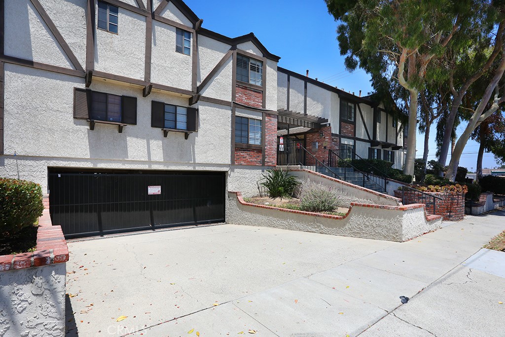 Welcome home! This beautifully upgraded two-story condo combines comfort, functionality, and convenience within the gated Buckingham Gardens community. Featuring two spacious master suites—each with private bath—one includes double closets and dual sinks for added luxury. The main level offers a bright, open floor plan with recessed lighting, a cozy fireplace and a convenient half bath, perfect for guests. The newly upgraded kitchen showcases modern finishes and ample cabinetry, complemented by fresh interior paint and newer flooring throughout. Additional highlights include an upstairs laundry area for added ease, a wet bar ideal for casual entertaining, and a private courtyard patio. The unit also comes with two subterranean gated parking spaces and extra storage. Located just minutes from the 405, 110, and 91 freeways, you’ll enjoy quick access to major shopping centers, local restaurants, and popular dining spots.
