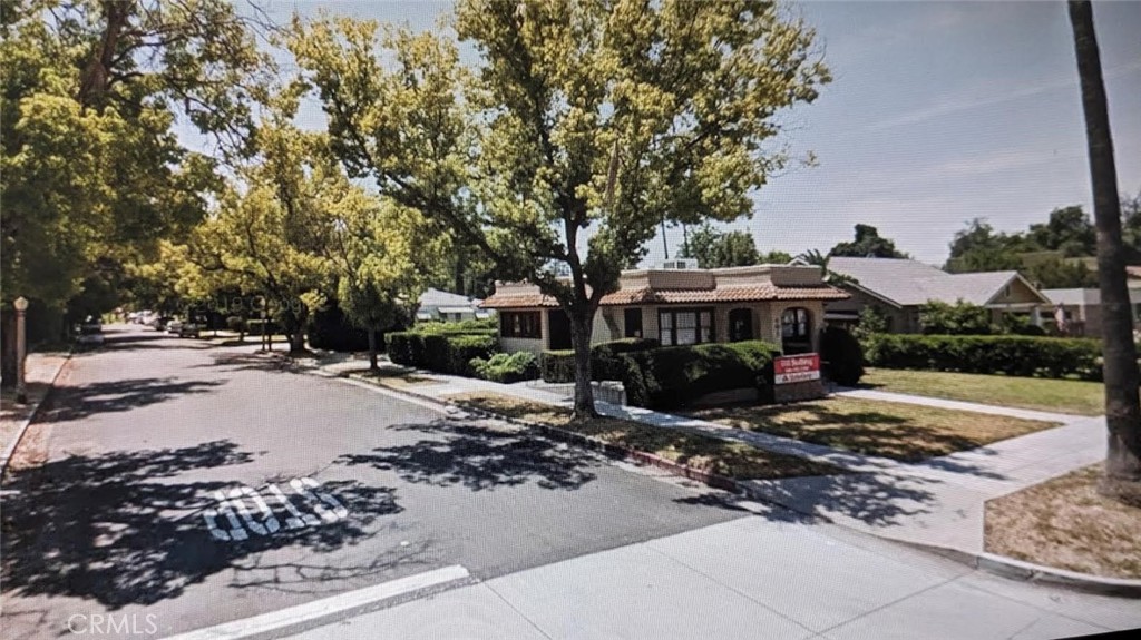 Prime Downtown Redlands Office Building located on the corner of Parkwood Drive and Brookside Ave...Zoning: A-P (Administrative & Professional Office District)... This building has 2 big offices, 2 Bathrooms, a Big kitchen, Reception Area and Lobby with a Fireplace....The East Office is approximately 12ft x 11ft. The West Office is approximately 11ft x 14 ft. The Reception area is approximately 14ft x 11ft. The Lobby waiting room is approximately 14ft x 7ft. The East bathroom inside the East office is approximately 8ft x 10ft. The Bathroom off the kitchen is approximately 5ft x 7 ft. The kitchen is approximately 10ft x 14ft....This building has the original windows and has a Tile roof...Corner Lot...Even though this lot only has 3 parking spaces and 1 Handicapped space at the rear of the building, there is plenty of street parking with direct access to the lot....This building is located very close to many vibrant and well established communities such as approx 1 minute from The Redlands Bowl Amphitheatre of performing Arts, approx 4 minutes from the Packing House Shopping District, walking distance from Downtown State Street Shopping District and Metrolink Train Station, approx 6 minutes from Kimberly-Crest House & Gardens, approx 2 miles from the Picturesque Carriage House Prospect Park, and many other fascinating attractions. This building has been used as an office for approximately 43 years by one owner....