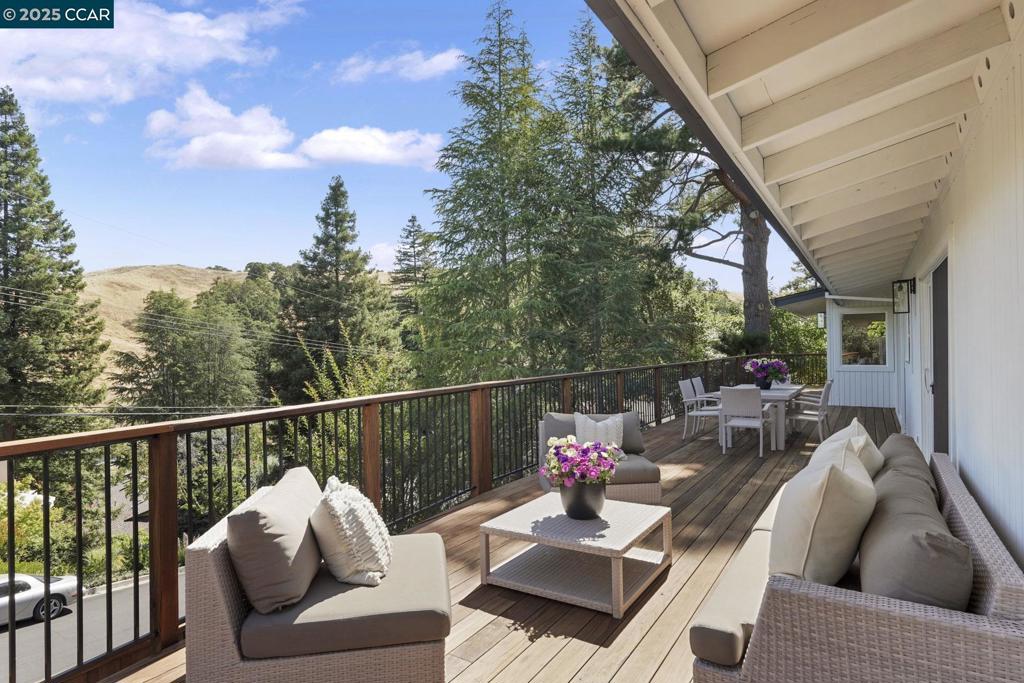 Just Completed! This beautifully remodeled two-story contemporary home is tucked into the serene hills of Burton Valley, blending mid-century charm with a sleek 2025 fit & finish. Originally built in 1964, this light-filled retreat has been completely transformed with thoughtful updates throughout. The reimagined interior showcases a modern open-concept kitchen that seamlessly flows into spacious living and dining areas, all anchored by a stunning double-sided fireplace. With 9 brand-new sliding glass doors, the home is bathed in natural light and offers picturesque views of the surrounding landscape from nearly every room. The 2790 sq. ft. home features 5 bedrooms and 3.5 fully renovated bathrooms, each designed with premium materials and contemporary styling. The lower level serves as a perfect teen hangout, private guest suite, or quiet work-from-home sanctuary.Enjoy multiple outdoor living areas, including a large upper deck, a lower-level patio, and an expansive rear yard with an oversized paver patio—ideal for entertaining or relaxing. This property offers the best of Lafayette living—just minutes from top-rated schools, vibrant downtown Lafayette, Walnut Creek, regional parks, trails, Hwy 24, Oakland, and San Francisco. Tell a friend!