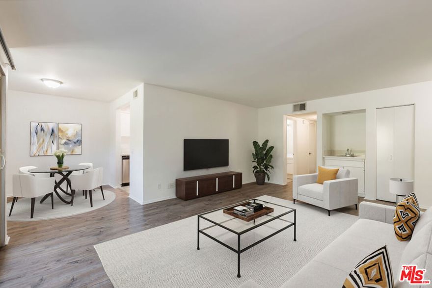 Step into this beautifully upgraded second-floor 2-bedroom, 2-bath condo, where modern style meets everyday comfort. An open-concept floor plan and expansive windows fill the home with natural light, creating an airy, uplifting atmosphere. The contemporary kitchen flows effortlessly into the dining and living areas, ideal for both relaxed evenings and hosting guests. Both bedrooms are generously sized, with the primary suite offering a private bath and a spacious walk-in closet. Enjoy resort-style living in a secured community featuring amenities such as a pool, spa, gym, clubhouse, and serene lake access. Located in a highly desirable neighborhood, this home is just a short distance from The Calabasas Commons, where you can enjoy dining, shopping, and entertainment right at your doorstep. Available move-in mid/late January