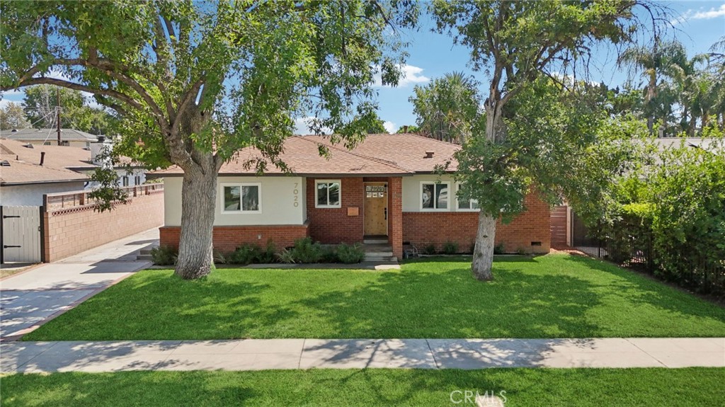 Welcome to this beautifully reimagined POOL home in the desirable Van Nuys/ Lake Balboa Neighborhood! Home features a detached 2-CAR GARAGE with expanded driveway, offering flexible parking options for multiple vehicles, potential RV, and other toys! This stunning 4-bedroom, 2-bathroom residence has been thoughtfully updated throughout and is ready for its next chapter. Step inside to a bright and airy open-concept layout. The remodeled kitchen is a true centerpiece, boasting sleek & ample new cabinetry, luxurious countertops, custom tile backsplash, and brand-new stainless-steel appliances. Seamlessly connected living and dining spaces make entertaining a breeze, while the stylish new flooring and designer fixtures bring a designer touch to every corner of the home. Indoor laundry adds everyday convenience, while the private primary suite with updated ensuite bath—offers your own peaceful retreat. Step outside to discover your own private backyard escape, ideal for hosting get togethers, or simply unwinding under the California sunshine. The detached garage and expanded driveway are ideal features for those looking for a potential ADU, extra storage, a home workshop, or space for your weekend gear. Additional features include NEW electrical panel, NEW dual pane windows, NEW water heater, recently replastered pool, etc! Situated in a desirable tree-lined Van Nuys neighborhood, this home is just minutes from shopping, dining, parks, and freeway access. Turnkey and move-in ready—this is Southern California living at its best!