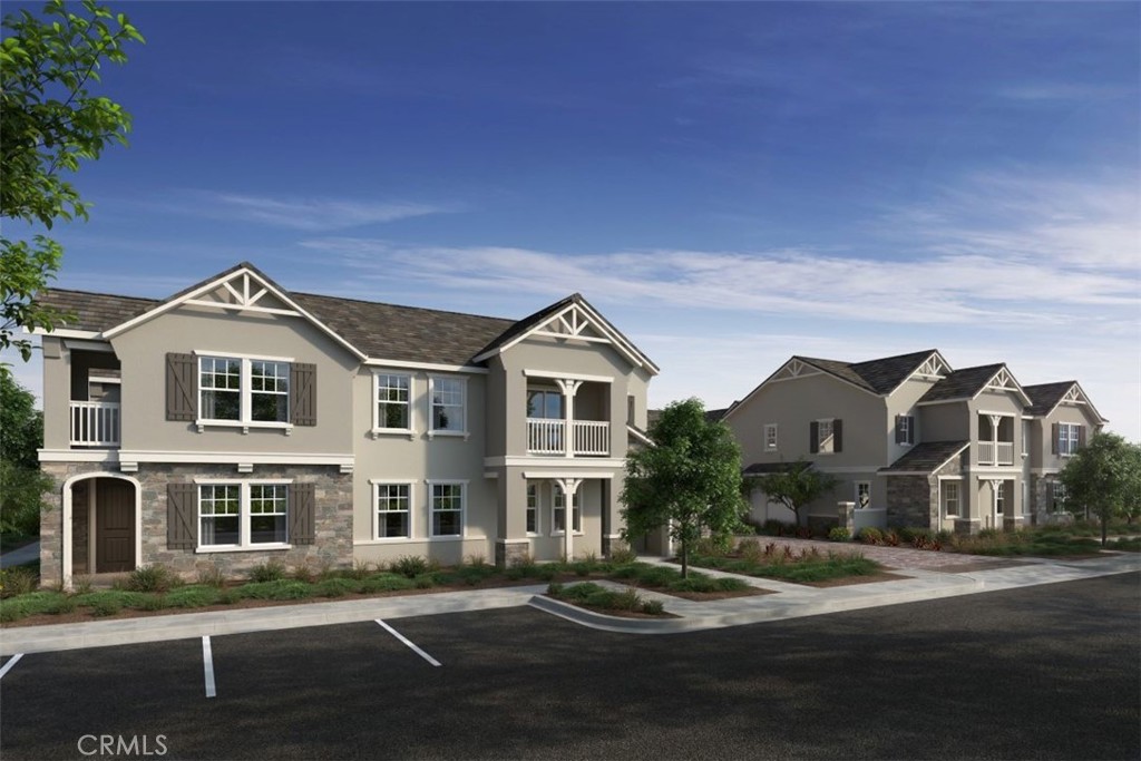 Belmont community is a beautiful brand-new resort-style community in South Ontario. This floorplan offers an open 1,193 sq/ft floor plan with expansive 9-ft ceilings and a bright and airy feel that is offered by walking distance to community pool and guest parking. The stylish kitchen features stylish shaker style cabinets, an expansive kitchen island, with a stainless large bowl sink, dining area, quartz countertops. Our homes offer brand-new Whirlpool® stainless steel gas cook top with oven, dish washer and out-side vented microwave. Additionally, there is convenient guest suite downstairs with full bathroom. The upstairs lead to a spacious primary bedroom,open concept kitchen and balcony for outdoor living. The exterior of the home has water-efficient front landscaping beyond the private patio. The energy efficiency of our Energy Star® certified home is complemented by an eco-friendly SunPower® solar energy system (included) Additional eco-friendly features are Smart thermostat, and dual-pane, low E glass windows to help ensure uninterrupted comfort all year long. Future community amenities include two parks, pool and spa, dog park, and pickleball courts. There is easy access to I-15, I-10, and 60 Freeways. You are also close to shopping at Costco®, 99 Ranch Market & Cloverdale Marketplace and Eastvale Gateway. The Ontario International Airport and Ontario Mills Mall are a short drive away. Moonstone is also just 2.5 miles from the brand-new Park View elementary school. Solar included, washer and dryer included!!!!!!
Photo is a rendering of the model. Solar Included