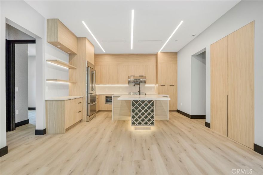 Be the first to live in this brand new 3 bedroom, 2 bath home (2025), offering approximately 1,122 sq ft of spacious interior with vaulted ceilings. Designed to feel like a private residence, it has its own separate address, gated entrance, and front yard.



The layout features a primary suite with dual walk-in closets (his & hers) and a walk-in shower with a built-in bench. Two additional bedrooms share a Jack & Jill bath with a full tub/shower combination, and each has its own closet. A separate laundry closet with washer & dryer is also included.



The chef’s kitchen shines with quartz countertops, a massive center island, high-end stainless steel appliances, custom cabinetry, and a pot-filler faucet over the oven range. Designer LED lighting, hardwood-style vinyl plank flooring, and modern energy-efficient systems enhance the living experience.

Bathrooms include LED faucet lighting that glows blue for cold water and red for hot, a unique and practical design touch.

Additional features include two gated parking spaces behind an electric fenced gate.

Prime Location: Minutes to Warner Center, Westfield Topanga & The Village, Pierce College, Winnetka Recreation Center, 101 & 118 freeways, parks, dining, and top-rated charter schools. Even the best photos can’t fully capture the warmth, quality, and versatility of this home. A personal visit reveals the full value of this unique offering!