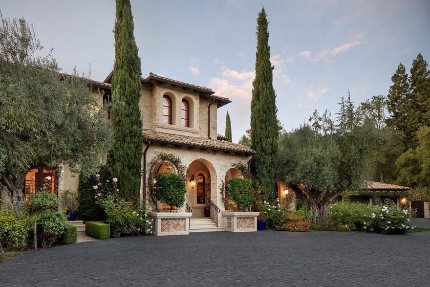 At the end of a cul-de-sac in the premier Circus Club area, this property was built in 2012 w/inspiration from the villas in Urbino, Italy. The entire property is masterfully finished w/an array of imported materials from the antique French roof tiles to the lavish exterior stone. Inside & out, an endless succession of design embellishments ...hand-scraped ceiling beams & walnut floors, rare stone surfaces, & hand-plastered walls & ceilings. Behind the scenes, distributed audio, programmable lighting,& a home automation system. Luxurious amenities highlighted by an extraordinary wine cellar, a home theater, & recreation lounge w/bar. Spacious terraces provide a seamless connection to the outdoors, some through fully retractable stacking walls of glass doors. This extraordinary property has a 1-bedroom guest house, outdoor dining & entertainment complex, & a saltwater pool & spa. A timeless masterpiece of enduring character & quiet elegance in the heart of the San Francisco Peninsula.