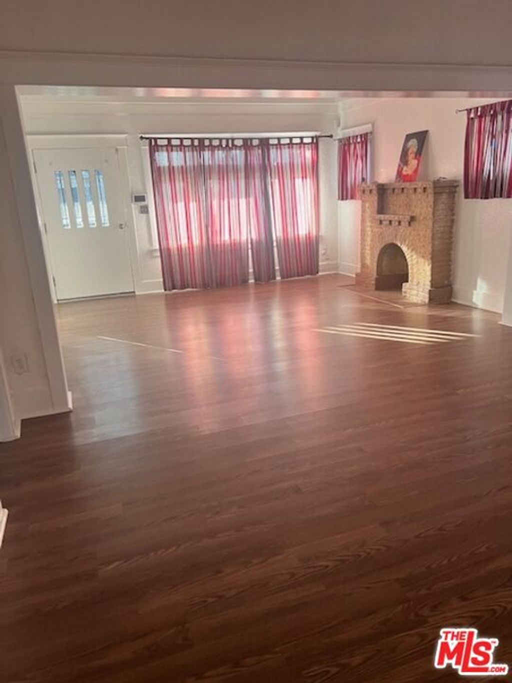 Photo of 4450 Towne Avenue, Los Angeles, CA 90011 (MLS # 26645555)