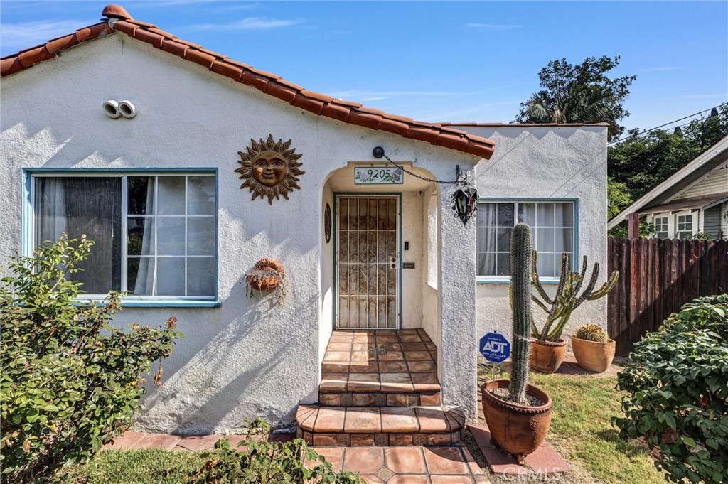 Welcome to 9205 Walnut St, a delightful Spanish-style gem nestled in the heart of Bellflower, right next to Lakewood. This cozy 2 bed, 1 bath home is full of character, featuring classic Spanish accents throughout. Relax in the tranquil garden with a soothing water fountain and an abundance of fruit trees—Lemon, Fig, Pomegranate, and Guava. The detached garage offers extra space and potential for an ADU conversion. Conveniently located near Lakewood Plaza for shopping, dining, and daily essentials, and just minutes from schools. A warm and inviting home with timeless charm—come see it in person!