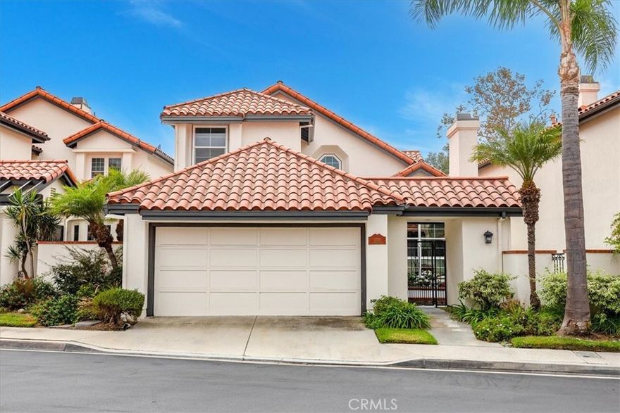 Welcome to 5720 Madrid Lane in the highly desirable Del Lago community of Long Beach. This beautifully maintained home offers three bedrooms and three bathrooms including two spacious master suites upstairs and one bedroom with a full bath on the main level. The open layout features soaring ceilings abundant natural light a cozy fireplace and a dining area that flows into the kitchen. The kitchen is complete with stainless steel appliances granite countertops and generous cabinet space. The backyard is a private retreat with a spa lush landscaping and peaceful views of the pond creating the perfect setting for entertaining or relaxation. Additional highlights include an attached two car garage wood style and tile flooring throughout and a light and bright interior. Conveniently located near Belmont Shore 2nd and PCH Colorado Lagoon and Marina Vista Park with easy access to freeways beaches and shopping this home is move in ready and offers the best of Long Beach living.