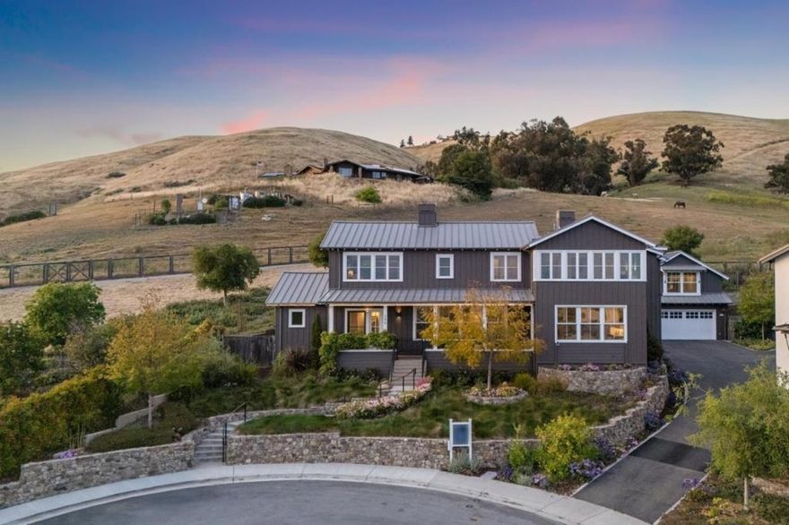 Nestled within a peaceful cul-de-sac and surrounded by the beauty of nature, 288 Campina Court boasts a rare blend of exquisite craftsmanship, privacy, and stunning views. Situated on over three-quarters of an acre in Fremonts prestigious Mission San Jose community, this semi-custom residence, designed and built in 2018 by the esteemed Robson Homes, showcases meticulous attention to detail, premium materials, and harmonious indoor-outdoor living. Inside, engineered hardwood spans the home's open-concept living spaces. Thoughtfully designed kitchen with top-tier appliances and and breakfast nook. Main level bedroom w/ ADA-compliant bath, and upstairs a luxury primary suite with vaulted ceilings, expansive windows, large walk-in closet and breathtaking views; 3 additional bedrooms, 2 of which en-suite and bonus room on upper level. Enjoy views from each and every window. Terraced yard showcases vibrant landscape and well-maintained hardscape with swim spa. Permitted 400sqft well-appointed ADU w/ own address provides additional living space. Enjoy top-tier build quality of your home and unbeatable 'best of both worlds' lifestyle of this exclusive Fremont residence.