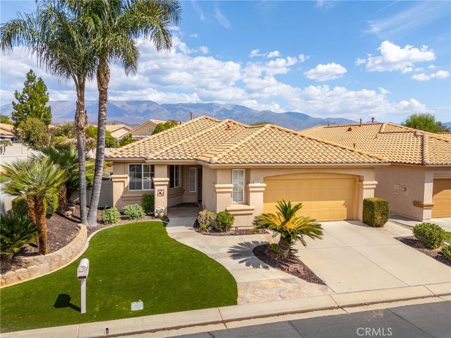 Spacious, inviting and full of light…welcome to 4945 Silverado Avenue in Sun Lakes Country Club; a picturesque, active lifestyle 55+ guard gated community. This desirable Forsythia Model offers with low maintenance landscape; freeing up your days to enjoy everything this golf course community offers! 



Featuring 2 bedrooms, 2 bathrooms, plus versatile den. In the kitchen, enjoy professionally painted cabinetry accented with premium brushed nickel hardware, under-cabinet lighting, granite countertops with bar seating, stainless steel appliances, and a walk-in pantry. 



The open-concept dining and living room invites you to gather with friends, featuring a built-in media niche, a cozy gas fireplace, and a sliding glass door that fills the space with natural light. 



The expansive primary suite is a retreat of its own, complete with a sliding glass door to the backyard, a spacious walk-in closet, and an en-suite bathroom with dual sinks, a wide mirror, and a step-in shower. 



Guests will appreciate their own private bedroom and full bathroom, while you will love the convenience of an indoor laundry room with storage and direct access to the 2-car garage, which includes cabinetry and a built-in workbench. 



Throughout the home you will find high ceilings, recessed lighting, ceiling fans, mirrored closets, and a neutral color palette that makes decorating easy.



Outdoors, you can unwind on an Epoxy-sealed pebbled patio beneath the Aluma-Wood cover, surrounded by rose bushes, a bird bath, and mountain views in both directions. The yard is designed with artificial turf and slate stone pathways, offering beauty without the hassle.



Life at Sun Lakes Country Club is second to none. Experience one of the two championship golf courses, fitness centers, pickleball, tennis, and live entertainment at one of the three clubhouses, where every day feels like a vacation. The community features a ballroom, a restaurant and lounge, indoor and outdoor resort-style pools, a library, over 80 clubs, and even private RV storage. Internet and cable are included with the HOA, and there are no Mello Roos taxes. Close to the 10 fwy, casino, and Cabazon Outlets. 



This turnkey home on a private corner lot, has been lovingly maintained by its original owners. All you need to do is move in, hop on your golf cart, and embrace the lifestyle that Sun Lakes has to offer.