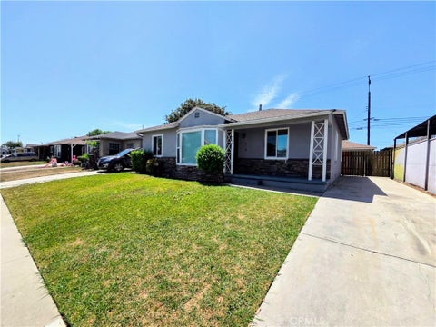 Photo of 705 N Hillford Avenue, Compton, CA 90220 (MLS # PW26188028)