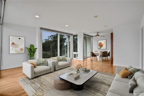 Photo of 2055 E Broadway #401, Long Beach, CA 90803 (MLS # PW26103059)