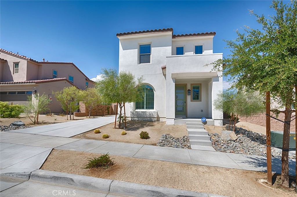 Welcome to Nova in University Park. Built by Woodbridge Pacific Group, this modern residence is designed to meet the needs of your contemporary lifestyle & is completely turnkey! This 1.5 yr old home is thoughtfully designed featuring 3 spacious bedrooms, 2.5 bathrooms, and is freshly custom painted throughout in a grey/beige neutral with accent walls in the bedrooms. Upgraded luxury vinyl plank flooring is complimented by durable tile in the bathrooms & laundry room, plus upgraded carpet in the upstairs hallway, bedrooms & stairs. The gourmet kitchen is a standout, boasting contemporary cabinetry, premium quartz countertops, chrome fixtures, stainless-steel appliances & a drinking water filtration system. Perfect for both everyday living & entertainment, this floor plan is open to the dining & great room areas. Every detail has been considered, including ceiling fans in all bedrooms, living & great room, plus an oversized ceiling fan on the covered patio for ultimate comfort. Two Google Nest thermostats control the HVAC system, ensuring efficiency & comfort year-round. Plantation shutters adorn the windows while black-out curtains enhance the sliding door in the dining area & at the upgraded, oversized sliding glass door in the great room. Bullnose corners add an extra touch of elegance throughout the home. The exterior is equally impressive, featuring a two-car garage with a large driveway, a water softener system & purchased solar panels for energy efficiency. The beautifully landscaped backyard is an entertainer's dream, offering style & functionality, making it the perfect setting to enjoy gatherings with friends & the Mt San Jacinto views. Nestled in a vibrant community with an array of outdoor amenities including a relaxing walkable community that offers a bark park for your furry friends, covered playgrounds & an event lawn with a stage area for gatherings. It also features The Grove, a state-of-the-art community center with a ballroom, gourmet kitchen, bocce ball & pickleball courts, BBQ area, firepit & fitness center. Outdoors, you'll enjoy access to a kiddie pool, a lap pool & a sparkling resort-style pool & spa, perfect for connecting, playing, or relaxing in the sun. With its impeccable design, modern conveniences & unparalleled community amenities, this home is the epitome of luxury & functionality. Don’t miss your chance to live in this extraordinary property.