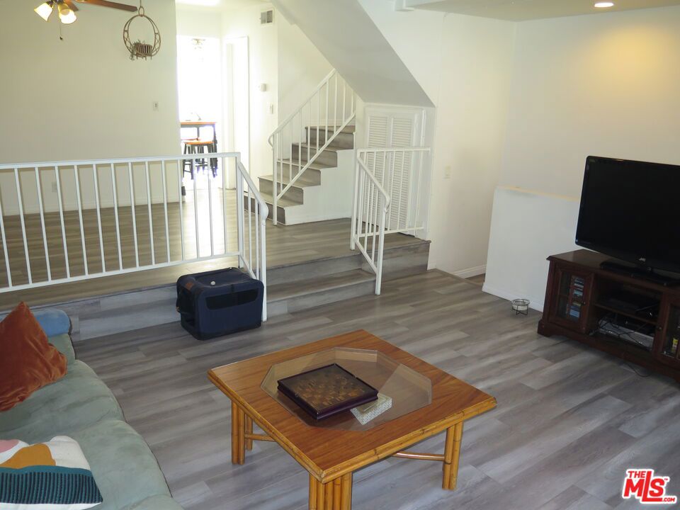 This spacious 3-story townhome condo with private 2-car garage has 1600 square feet with 3 bedrooms and 2.5 baths! New incredibly sunny remodeled kitchen with stainless steel appliances and breakfast area, dining room, living room with fireplace, central air and heat, private WASHER/DRYER, PRIVATE 2 CAR GARAGE with direct access, community POOL ,all NEW HARDWOOD floors (disregard any photos of carpet which has been replaced) PRIVATE outdoor hardwood PATIO off living room AND balcony off master. Quiet building and best condo in Van Nuys. Great for family, entertaining or rooommates! Available SEPTEMBER 1, 2025.