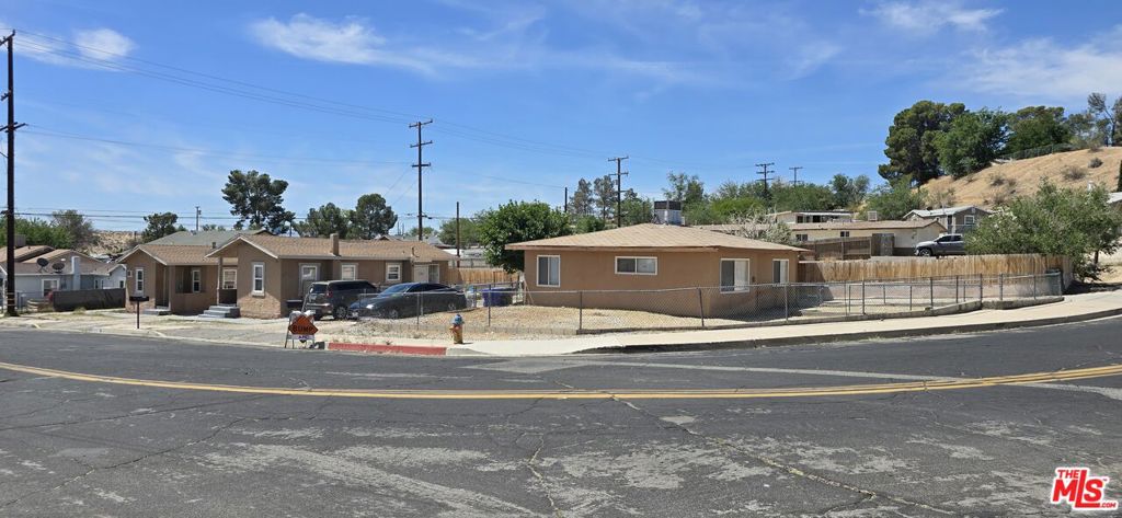 Exceptional investment opportunity in Victorville! This unique property features three single-family homes on one lot, each with its own mailing address and all currently tenant-occupied offering immediate cash flow. The two 2-bedroom homes feature newer windows, updated bathrooms, flooring, and A/C units or swamp cooler. The spacious 3-bedroom home includes an attached garage with washer/dryer hookups, a newer garage door, updated kitchen, bathroom, flooring, and central A/C. Conveniently located near schools and just minutes from freeway access. This turnkey investment is a must-see and checks all the boxes for smart investors!