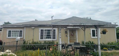 Photo of 2019 FAIRHAVEN ST ST, Lemon Grove, CA 91945 (MLS # 260012694SD)
