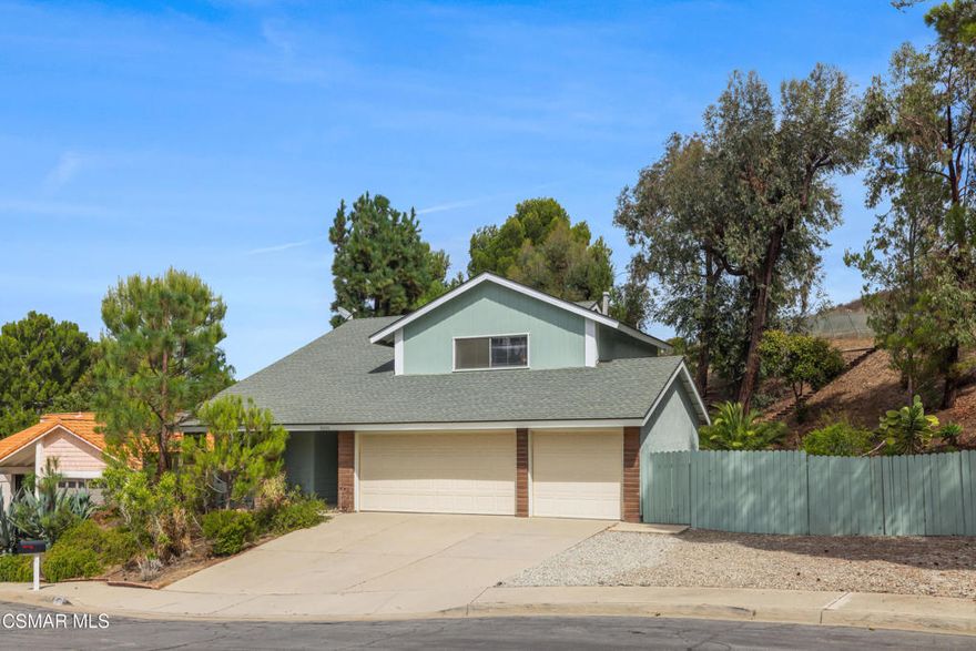 Nestled at the end of a quiet cul-de-sac, this 4 bedroom, 2.5 bathroom home at 3050 Wildwood Ave offers comfort, convenience, and stunning hillside views. You are greeted with natural rustic landscaping and a double-door entry, once you cross the threshold you'll enjoy a grand open living room and dining area. Enjoy cooking in your renewed kitchen with white cabinets and newer appliances, plus a light and bright family room with a gas fireplace creating a cozy ambience. Atop the stairs you will find 3 generous sized bedrooms with large closets and a shared bath. The master suite features a grand walk-in closet, dual sinks, and a renovated oversized tub & shower combo for relaxing evenings. Additional highlights include a three-car garage with washer and dryer included without warranty, RV or boat parking, and a private backyard with new artificial turf, shady pergola with plenty of space to unwind. Located in Thousand Oaks, the home is close to shopping, dining, and outdoor recreation. Available for rent now: don't miss this rare opportunity for serene space and privacy in a prime location!