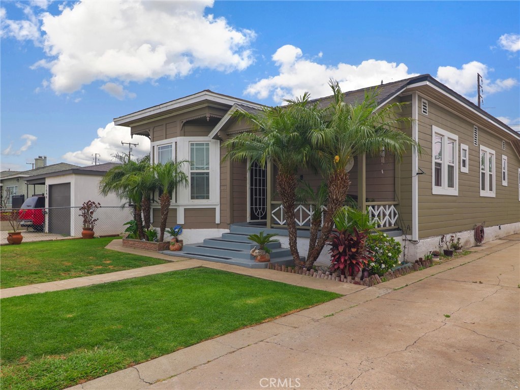 Charming Single level Pool Home located in Carson! Situated on a spacious 5,350 Sq Ft lot complete with 3 bedrooms, 2 bathroom with approximately 1,348 Sq Ft of living space. Step into an inviting home with laminate flooring in the living room, that leads to a cozy dining room. The backyard features a Refreshing Swimming Pool, great for family fun entertainment and to cool down on a hot day. The front yard is landscaped and gated, great for children and dogs to run around and play. Other amenities this property has to offer is a detached 2-car garage with long driveway for plenty of parking. This property is in close proximity to shopping, dining, schools. Make this house your Home Sweet Home.