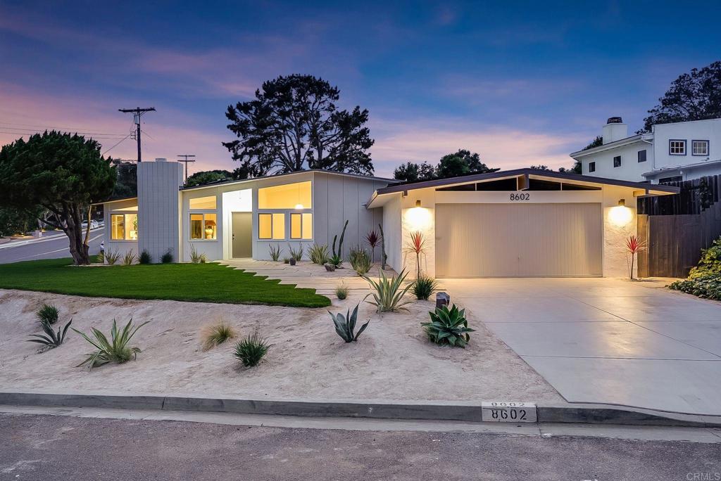Mid-century modern elegance meets contemporary comfort at this fully renovated single-level home in coveted La Jolla Scenic Heights. Perched on a quiet cul-de-sac corner lot spanning over 11,500 sq ft, this 4-bedroom, 2.5-bath residence showcases iconic 1960s architecture with vaulted ceilings, crisp lines, and an open, airy layout. Newly completed in 2025, the home features wide-plank White Oak engineered flooring, dual-pane windows and sliders, and a solar power system—offering beauty, efficiency, and timeless appeal. The designer kitchen is a standout, boasting custom two-toned white oak cabinetry, marble countertops, and integrated appliances including a Smeg Prostyle gas range, Bosch panel-ready dishwasher, and counter-depth KitchenAid refrigerator. Remodeled bathrooms include handcrafted vanities, custom tile showers, and elegant marble finishes. With all-new HVAC, ducting, water heater, and electrical panel, this home is truly turnkey. The oversized pool-ready lot offers endless potential for outdoor living, just minutes from the coast, La Jolla Village, and top schools.