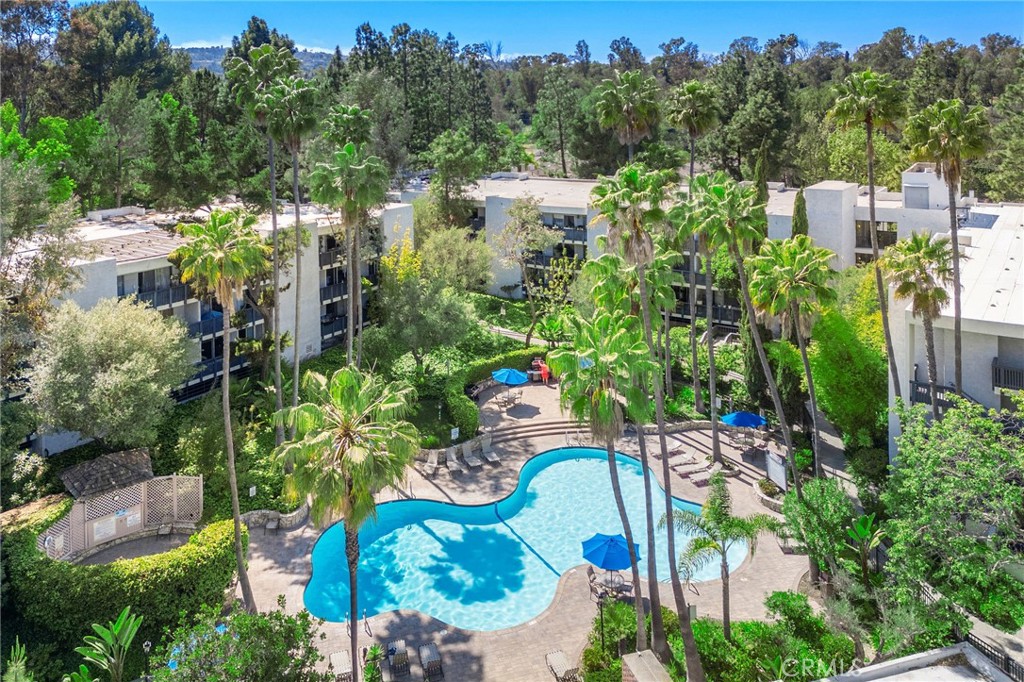 Tranquil Resort Living! Penthouse privacy, treetop views, and sun-soaked spaces await at The Estates. Fresh carpet, a hidden Murphy bed, and an updated kitchen make this top-floor retreat move-in ready. Step outside to lush tropical gardens, a sparkling pool, spa, tennis courts, and more — everyday life feels like a vacation. Set in peaceful Rolling Hills Estates, you're minutes from scenic hiking trails, luxury shopping, and Palos Verdes' stunning beaches — the best of South Bay living, wrapped in calm.
Don't miss out! Schedule your private tour today and claim your piece of paradise!