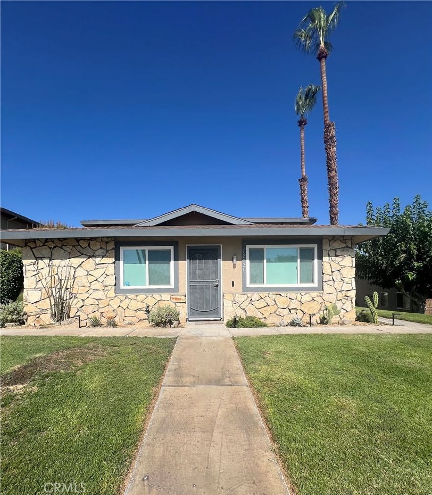 Wow! Be one of the first guests to step into this stunning, FULLY FURNISHED, newly remodeled, single-story Palm Desert condo that perfectly blends the 1960's character with all new modern amenities and upgrades. The interior highlights an open and bright layout, with a huge kitchen island, brand new custom cabinetry and upgraded appliances.  Nothing has been spared in the making of this unit to be invitingly comfortable, while also offering modern technology and a small workspace, if needed.  So much thought and care went into the "custom" design touches, of the electric fireplace, custom curtains, bedding and lighting.  The unit looks like a sweet little cottage that sits out front with no unit above or below it.  The prime location is just a 3-minute ride to the famous El Paseo shops and restaurants AKA "The Rodeo Drive of the Desert".  An appx. 15-munute ride will get you to the Indian Wells Tennis Garden tournaments, and an appx., 20 -minute drive to the Coachella Valley Music Festival. If you just want to have peace and quiet, just put on your hiking boots and catch the scenic hiking trails located directly behind the complex which is a great way to enjoy the scenic natural beauty of the Palm Desert area OR go for a dip in one of the two sparkling swimming pools and spas in the community.   Hurry and book it before it is gone!  30-Day minimum stay is required.