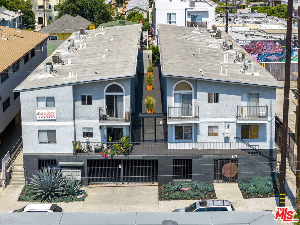 We are pleased to present The Marq, a 24-unit multifamily investment opportunity located in the heart of Highland Park at 117 S Avenue 64, just south of York Boulevard and east of North Figueroa Street. Built in 1989, the property is exempt from the Los Angeles Rent Stabilization Ordinance, offering investors greater flexibility and income potential. The Marq features a highly desirable unit mix of 16 one-bedroom and eight two-bedroom apartments, with gated ground-level parking comprising 14 single spaces and 12 tandem spaces. This offering provides immediate strong in-place cash flow with a current 5.85% CAP rate and 10.56 GRM, and is priced attractively at $289,583 per unit. Most of the units have been extensively renovated and include modern finishes such as stainless steel appliances, quartz countertops, upgraded cabinetry, vinyl plank flooring, and central air conditioning. Second-floor units boast vaulted ceilings and private balconies, enhancing the tenant living experience. The secured-entry property also includes a community laundry room with two washers and two dryers. Positioned in one of Northeast Los Angeles' most vibrant and rapidly appreciating neighborhoods, The Marq benefits from strong rental demand and robust local demographics, with average household incomes around $125,000 and median home values exceeding $900,000 within a two-mile radius. The property offers easy access to Downtown Los Angeles, Pasadena, Glendale, Echo Park, and Silver Lake via the 110 Freeway and the nearby Metro Gold Line Highland Park Station. With a Walk Score of 92, residents enjoy close proximity to popular destinations including Highland Park Bowl, Kitchen Mouse, Civil Coffee, and a variety of local art galleries and boutiques, making The Marq a compelling opportunity for investors seeking stable cash flow and long-term appreciation in a prime location.