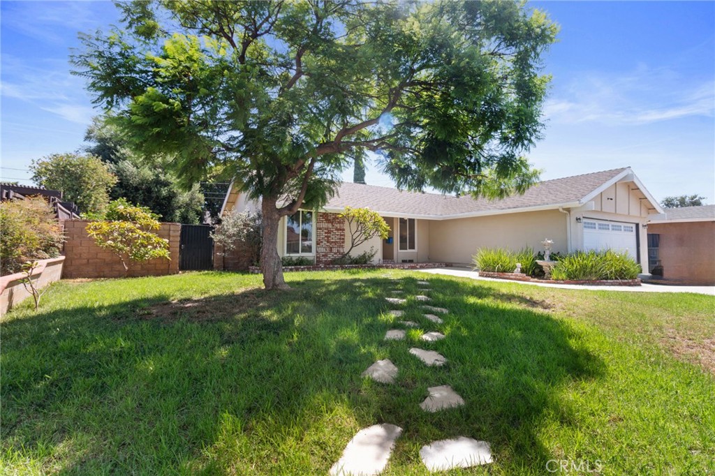 Welcome to your next home! Nestled in a quiet cul-de-sac on a highly desirable area of Orange, this beautiful upgraded single story residence offers comfort, convenience, and charm. Featuring 4 bedrooms, 2 baths with gleaming hardwood floors, neutral toned colors, double paned beveled glass windows/doors, cozy fireplace in living room, central air and heat, ceiling fans, space saving closet organizers, and ample storage space. Step outside to a spacious yard with a covered patio ideal for entertaining or relaxing. This property also includes RV parking, adding convenience for adventurers or extra vehicles. Ideally located close to 91/55/57/22 freeways, good school district, popular attractions nearby, and convenient to retail shops, churches and restaurants. This house comes unfurnished.